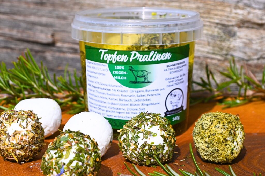 Ziegentopfen-Pralinen mit Kräutern und Blüten in Sonnenblumenöl vom Schneiderhof aus Dölsach